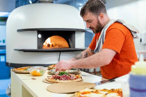 Chef Making The Best Authentic Italian Pizza at Zia Lucia in Boxpark Wembley Park