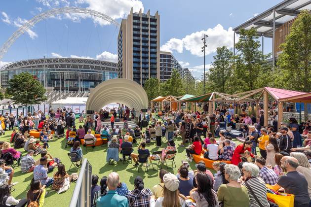 People attending Wembley events at Samovar Space on Olympic Way during summer