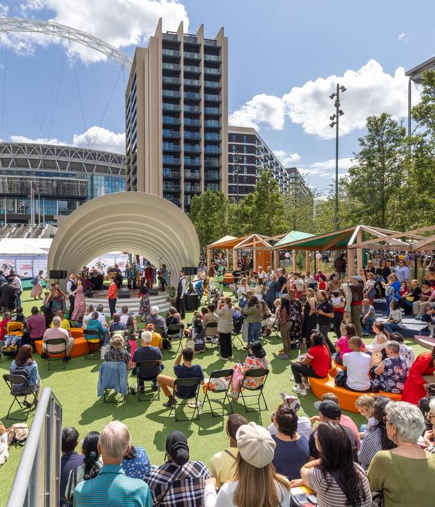 People attending Wembley events at Samovar Space on Olympic Way during summer